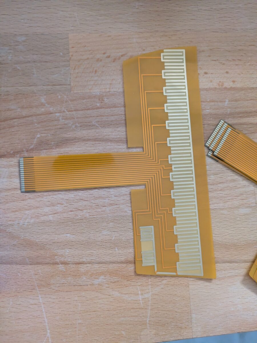 A newly manufactured Omnichord strumplate circuit on the bench